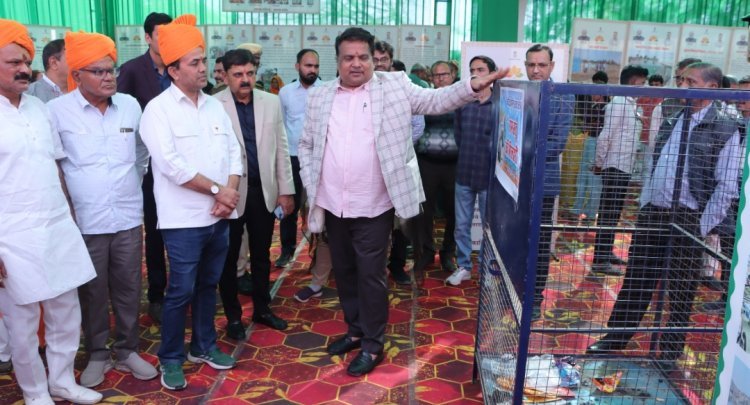 विकास पुस्तिका का विमोचन प्रदर्शनी का उद्घाटन